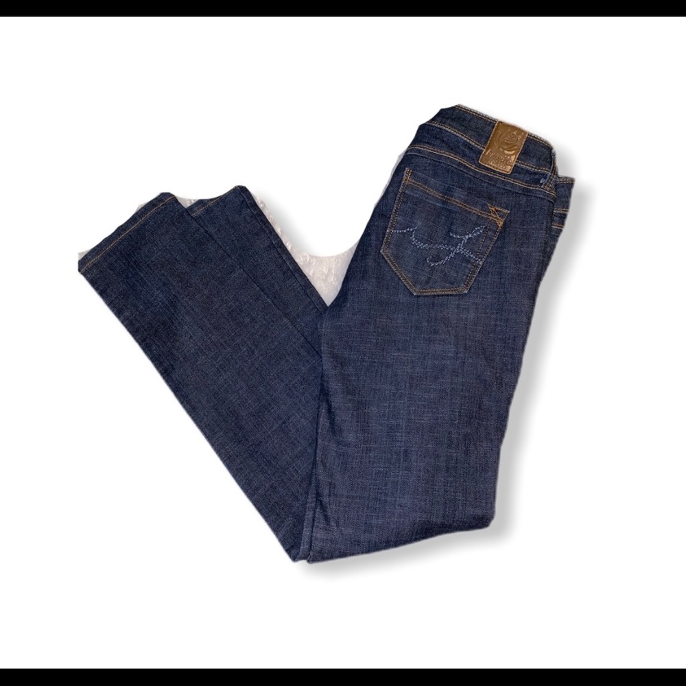 Fragile skinny blue jeans
